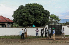 Uganda arrests 20 'collaborators' over horrific school massacre