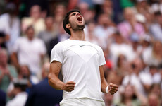 Carlos Alcaraz toughs it out to reach Wimbledon last 16