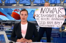 Russian journalist who protested on TV jailed for over eight years in absentia