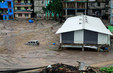 At least 31 people dead and nearly 100 others missing after devastating flash floods in India