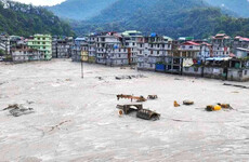 77 people die in floods in India after glacial lake bursts