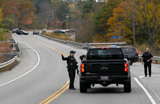 US police struggle to find man who killed 18 people in mass shooting in Maine town