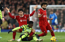 Arsenal guarantee top spot at Christmas by holding out for draw at Liverpool