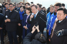 South Korean opposition leader stabbed in neck