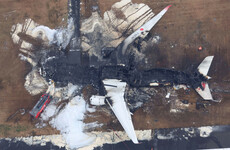 'A miracle we survived': Authorities probe cause of runway crash in Japan