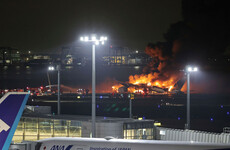Pilots on Japan Airlines plane that caught fire had no 'visual contact' before collision