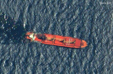 Cargo ship loaded with fertiliser sinks after being damaged by Houthi missiles, Yemen says