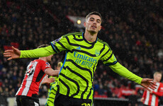 Arsenal make Premier League history and keep pressure on Liverpool