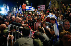 Israeli PM Benjamin Netanyahu branded 'traitor' in fourth consecutive night of protests