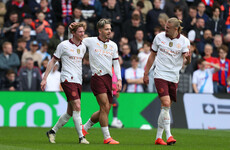 Man City survive scare to go level with Liverpool