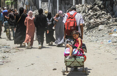 Palestinians flee Gaza City's Shujaiya district after fourth day of heavy bombardment