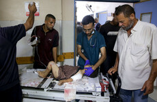 Israel strikes UN agency's building in Gaza, day after attack on school being used as a shelter