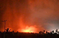 Volcanic eruption in Indonesia spews fireballs and kills at least ten people