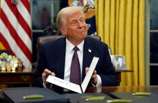 Trump grants pardons to 1,500 US Capitol rioters and withdraws from Paris climate accord