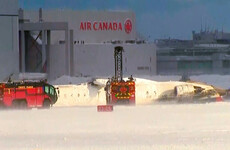 Crash landing: Seventeen injured as Delta jet flips upside down at Toronto airport