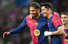 Barcelona thrash 10-man Real Sociedad to reclaim top spot