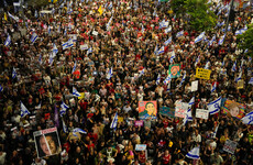 Families of Israeli hostages and freed captives urge Netanyahu to implement Gaza deal