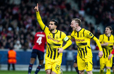 Ex-Liverpool star helps Dortmund reach last 8