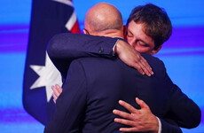 Australia's right-wing opposition leader loses seat as returning PM promises to 'work hard'