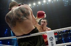 Going the distance: Klitschko sees off Wach to retain world titles