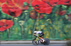 Welshman Tarling wins Giro time trial in Tirana, Roglic in pink