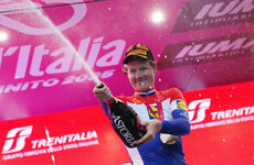 Del Toro holds Giro lead as Hoole wins rainy time trial