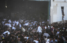 Four dead after thousands of desperate people storm World Food Programme warehouse in Gaza