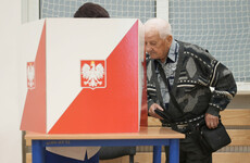 Poles go to the polls as voting in tight presidential election gets underway