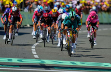 Milan wins baking Tour de France eighth stage in mass sprint