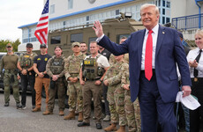 Trump visits troops deployed to Washington DC and says they'll stay there 'for a while'