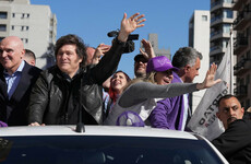 Argentine President Javier Milei pelted with rocks by protesters amid corruption scandal