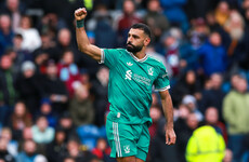 Last-gasp Salah goal sees Liverpool stay perfect