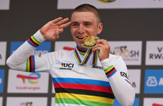 Remco Evenepoel wins third straight time-trial cycling world title