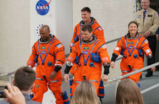 Crowds gather as astronauts arrive at launch pad ahead of historic Moon mission