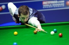 Teenage prodigy Brecel advances to quarters
