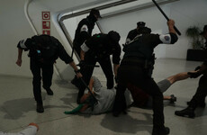Police seen beating people at Spanish airport as Gaza activists return