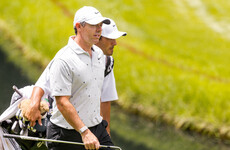 McIlroy and Lowry 8 shots off lead at storm-hit PGA Memorial