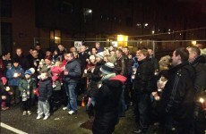 Priory Hall residents hold vigil ahead of second Christmas