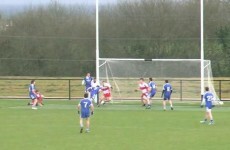 GAA player scores a header in today's Ballinderry-Donagh clash