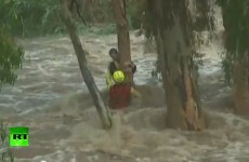 Four dead, dramatic rooftop rescues in Australia floods
