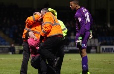 Another idiotic fan shoved a goalkeeper to the ground in League Two tonight