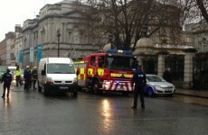 PHOTOS: Man threatens to set himself alight outside Leinster House