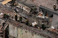 One dead, 13 hurt in US building collapse