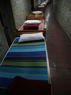 PHOTOS: Chilean torture centre converted into homeless shelter
