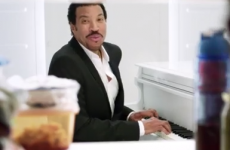 WATCH: Lionel Richie sings in a fridge and serves beer
