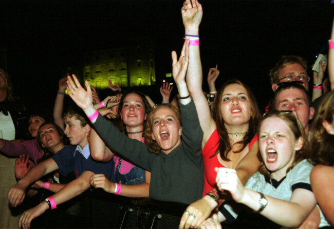 Fans at the front of the 80,000 strong crowd, who