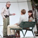 French President Nicolas Sarkozy's wife Carla Bruni Sarkozy, right, is pictured with U.S director Woody Allen, left, and U.S actor Owen Wilson, center. (AP Photo/Thibault Camus)