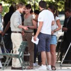 Carla Bruni Sarkozy, center, is pictured with U.S actor Owen Wilson, center left, as they arrive at the filming of