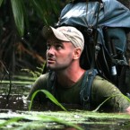 Ed Stafford wading in the Amazon River.