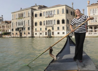 Giorgia Boscolo rides her gondola in Venice's Grand Canal, Italy